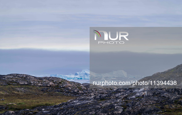 The Ilulissat Icefjord, also known as Sermeq Kujalleq, is draining approximately 7% of Greenland's ice sheet in Ilulissat, Greenland, on Jul...