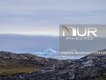 The Ilulissat Icefjord, also known as Sermeq Kujalleq, is draining approximately 7% of Greenland's ice sheet in Ilulissat, Greenland, on Jul...