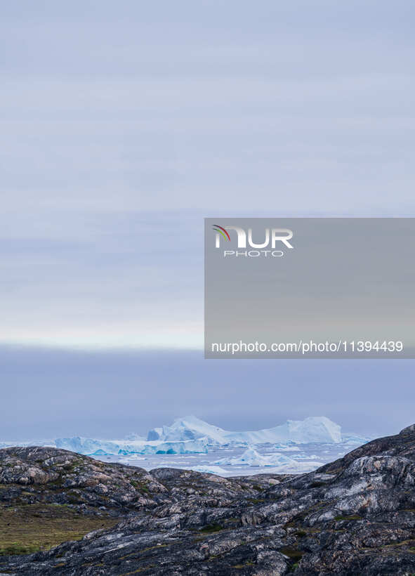 The Ilulissat Icefjord, also known as Sermeq Kujalleq, is draining approximately 7% of Greenland's ice sheet in Ilulissat, Greenland, on Jul...