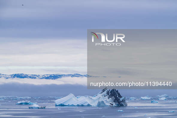 The Ilulissat Icefjord, also known as Sermeq Kujalleq, is draining approximately 7% of Greenland's ice sheet in Ilulissat, Greenland, on Jul...