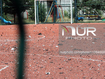 Debris is carpeting a sports ground after the Russian missile attack in Dnipro, Ukraine, on July 8, 2024. NO USE RUSSIA. NO USE BELARUS. (