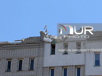 The roof of a residential building is being damaged by the Russian missile attack in Dnipro, Ukraine, on July 8, 2024. NO USE RUSSIA. NO USE...