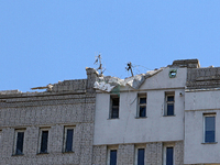 The roof of a residential building is being damaged by the Russian missile attack in Dnipro, Ukraine, on July 8, 2024. NO USE RUSSIA. NO USE...