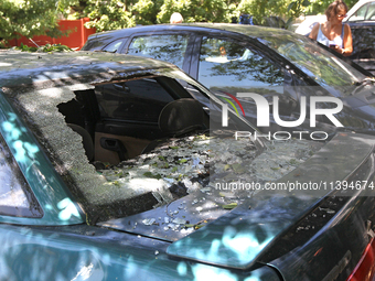 A car is being damaged by the Russian missile attack in Dnipro, Ukraine, on July 8, 2024. NO USE RUSSIA. NO USE BELARUS. (