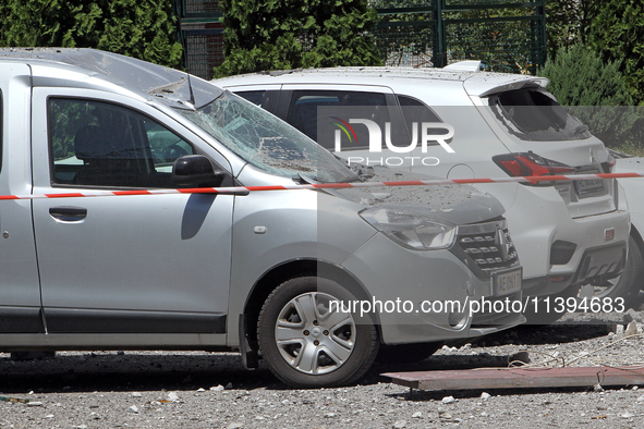 A caution tape is sealing off cars damaged by the Russian missile attack in Dnipro, Ukraine, on July 8, 2024. NO USE RUSSIA. NO USE BELARUS....