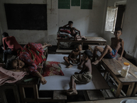 Flood-affected kids are staying at a temporary flood shelter center in Jamalpur, Bangladesh, on July 9, 2024. (