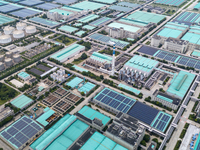 A corner of the rooftop distributed photovoltaic power generation project of Hengli (Nantong) Industrial Park is being shown in Tongzhou dis...