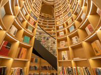 Children are reading at the Book? inside reading space in Hefei, China, on July 9, 2024. (