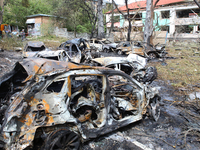 Burnt-out cars are being pictured at a kindergarten in the Holosiivskyi district destroyed by the Russian missile attack in Kyiv, Ukraine, o...