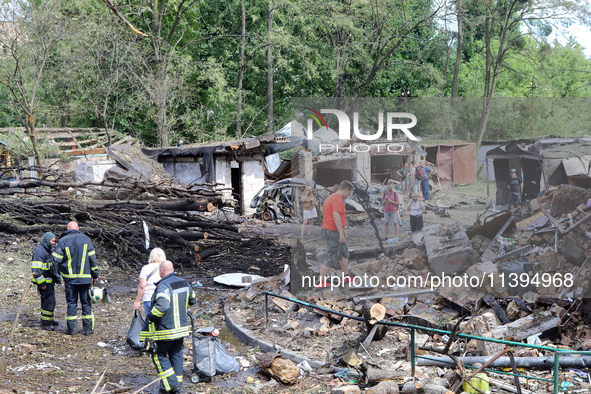 Garages in the Holosiivskyi district are being destroyed by the Russian missile attack in Kyiv, Ukraine, on July 8, 2024. NO USE RUSSIA. NO...