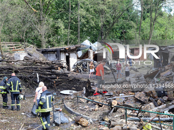 Garages in the Holosiivskyi district are being destroyed by the Russian missile attack in Kyiv, Ukraine, on July 8, 2024. NO USE RUSSIA. NO...