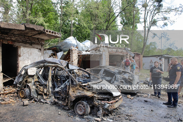 Garages in the Holosiivskyi district are being destroyed by the Russian missile attack in Kyiv, Ukraine, on July 8, 2024. NO USE RUSSIA. NO...