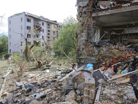 One of the apartments is being pictured at a five-storey residential building in the Holosiivskyi district damaged by the Russian missile at...