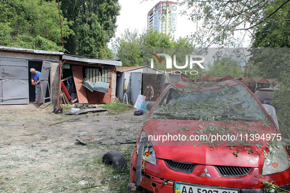 Garages in the Holosiivskyi district are being destroyed by the Russian missile attack in Kyiv, Ukraine, on July 8, 2024. NO USE RUSSIA. NO...