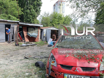 Garages in the Holosiivskyi district are being destroyed by the Russian missile attack in Kyiv, Ukraine, on July 8, 2024. NO USE RUSSIA. NO...