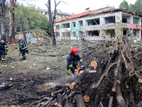 Rescuers are working near a kindergarten in the Holosiivskyi district destroyed by the Russian missile attack in Kyiv, Ukraine, on July 8, 2...