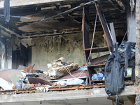 One of the apartments is being pictured at a five-storey residential building in the Holosiivskyi district damaged by the Russian missile at...