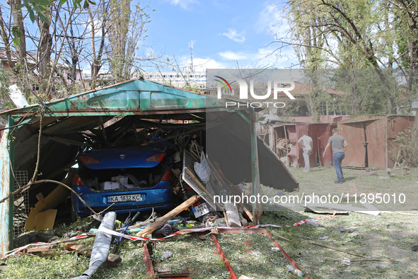 Garages in the Holosiivskyi district are being destroyed by the Russian missile attack in Kyiv, Ukraine, on July 8, 2024. NO USE RUSSIA. NO...