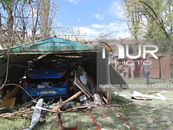 Garages in the Holosiivskyi district are being destroyed by the Russian missile attack in Kyiv, Ukraine, on July 8, 2024. NO USE RUSSIA. NO...