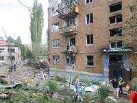 Burnt-out cars are being pictured at a five-storey apartment block in the Holosiivskyi district destroyed by the Russian missile attack in K...