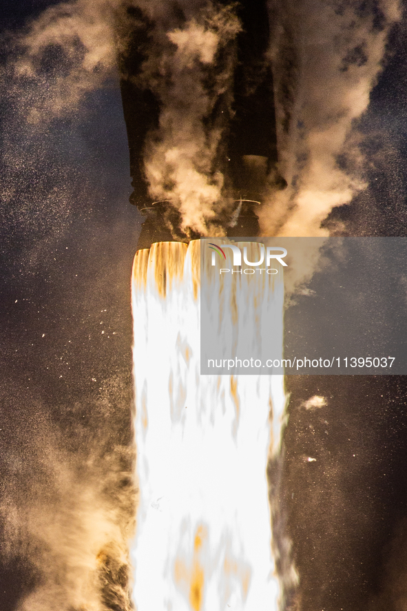 The details of the nine Merlin engines of a Falcon 9 rocket from SpaceX are being seen seconds after its launch from launch pad-40 at the Ca...