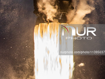 The details of the nine Merlin engines of a Falcon 9 rocket from SpaceX are being seen seconds after its launch from launch pad-40 at the Ca...