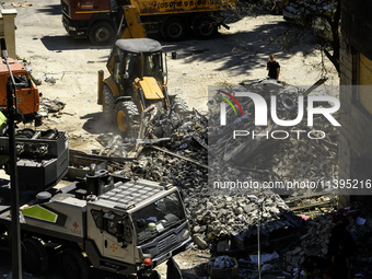 Rescuers are continuing to work at the Okhmatdyt children's hospital, which is heavily damaged by a Russian missile strike in Kyiv, Ukraine,...