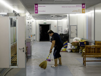 Staff are cleaning the premises of the Ohmatdyt Children's Hospital that was strongly damaged during a Russian missile strike in Kyiv, Ukrai...