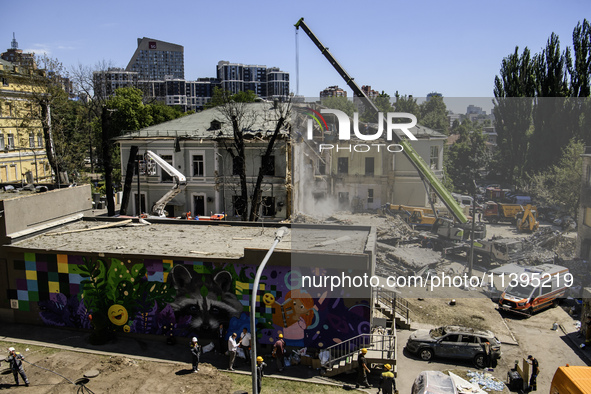 Rescuers are continuing to work at the Okhmatdyt children's hospital, which is heavily damaged by a Russian missile strike in Kyiv, Ukraine,...