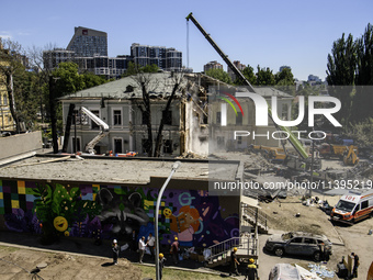 Rescuers are continuing to work at the Okhmatdyt children's hospital, which is heavily damaged by a Russian missile strike in Kyiv, Ukraine,...