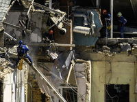 Rescuers are continuing to work at the Okhmatdyt children's hospital, which is heavily damaged by a Russian missile strike in Kyiv, Ukraine,...