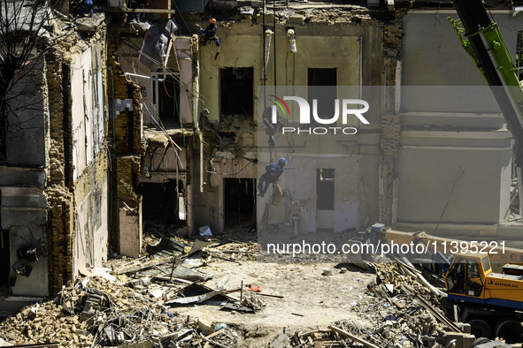 Rescuers are continuing to work at the Okhmatdyt children's hospital, which is heavily damaged by a Russian missile strike in Kyiv, Ukraine,...