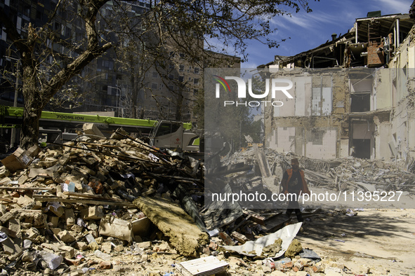 Rescuers are continuing to work at the Okhmatdyt children's hospital, which is heavily damaged by a Russian missile strike in Kyiv, Ukraine,...