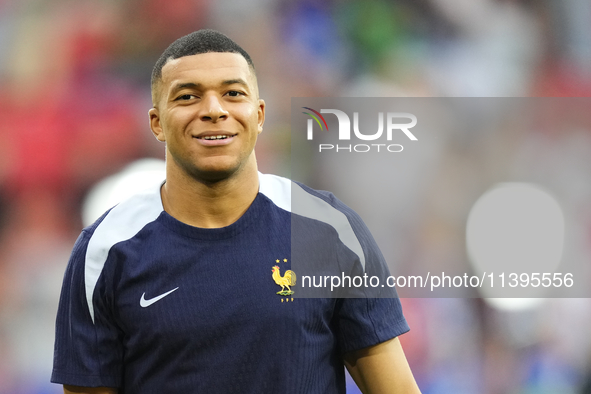 Kylian Mbappe centre-forward of France and Real Madrid during the warm-up before  the UEFA EURO 2024 semi-final match between Spain v France...