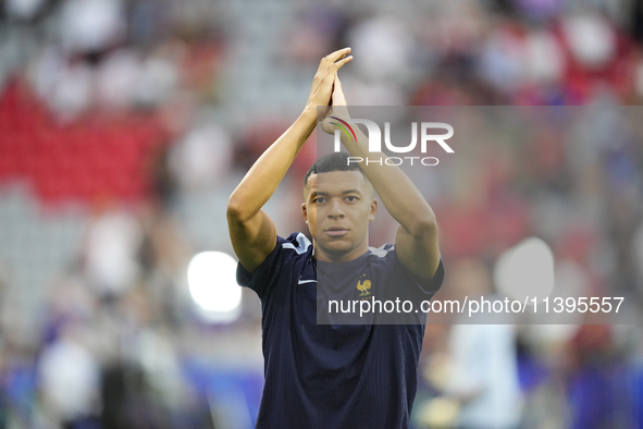 Kylian Mbappe centre-forward of France and Real Madrid during the warm-up before  the UEFA EURO 2024 semi-final match between Spain v France...