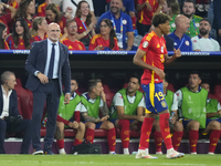 Miguel de la Fuente head coach of Spain congratulations to Lamine Yamal right winger of Spain and FC Barcelona during the UEFA EURO 2024 sem...