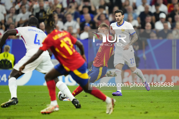 Dani Olmo attacking midfield of Spain and RB Leipzig shooting to goal during the UEFA EURO 2024 semi-final match between Spain v France at M...