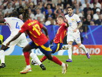 Dani Olmo attacking midfield of Spain and RB Leipzig shooting to goal during the UEFA EURO 2024 semi-final match between Spain v France at M...