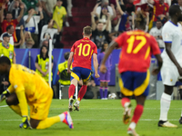 Dani Olmo attacking midfield of Spain and RB Leipzig celebrates after scoring his sides first goal during the UEFA EURO 2024 semi-final matc...