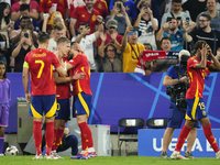 Dani Olmo attacking midfield of Spain and RB Leipzig celebrates after scoring his sides first goal during the UEFA EURO 2024 semi-final matc...