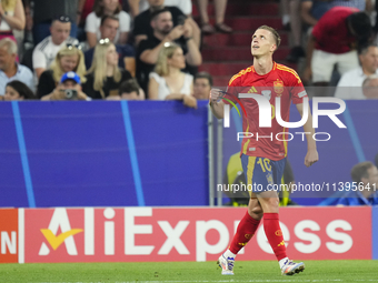 Dani Olmo attacking midfield of Spain and RB Leipzig celebrates after scoring his sides first goal during the UEFA EURO 2024 semi-final matc...