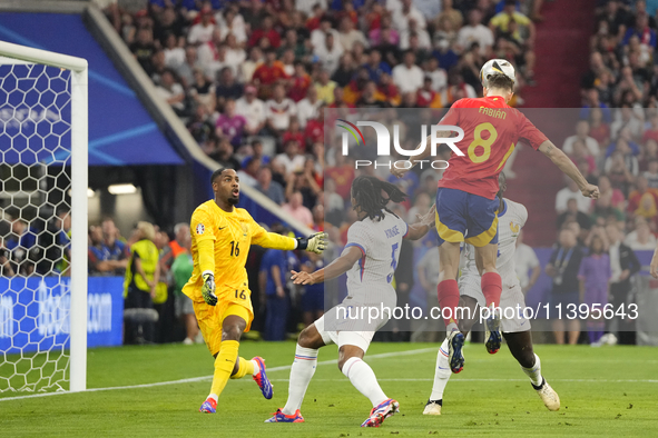 Fabian Ruiz central midfield of Spain and Paris Saint-Germain shooting to goal during the UEFA EURO 2024 semi-final match between Spain v Fr...