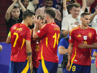 Dani Olmo attacking midfield of Spain and RB Leipzig celebrates after scoring his sides first goal during the UEFA EURO 2024 semi-final matc...