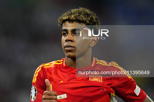 Lamine Yamal right winger of Spain and FC Barcelona reacts during the UEFA EURO 2024 semi-final match between Spain v France at Munich Footb...