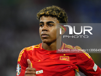 Lamine Yamal right winger of Spain and FC Barcelona reacts during the UEFA EURO 2024 semi-final match between Spain v France at Munich Footb...