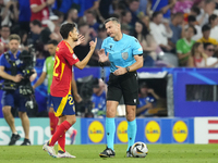 Jesus Navas right-back of Spain and Sevilla FC protest to referee during the UEFA EURO 2024 semi-final match between Spain v France at Munic...