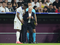 Didier Deschamps head coach of France gives instructions to Aurelien Tchouameni defensive midfield of France and Real Madrid during the UEFA...