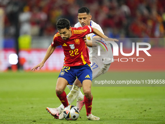 Jesus Navas right-back of Spain and Sevilla FC and William Saliba centre-back of France and Arsenal FC compete for the ball during the UEFA...