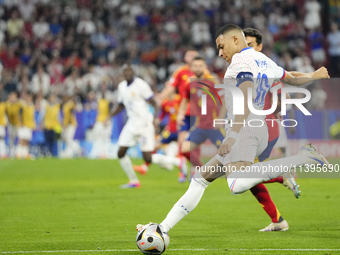 Kylian Mbappe centre-forward of France and Real Madrid shooting to goal during the UEFA EURO 2024 semi-final match between Spain v France at...