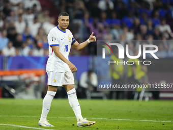 Kylian Mbappe centre-forward of France and Real Madrid reacts during the UEFA EURO 2024 semi-final match between Spain v France at Munich Fo...